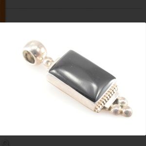 Black onyx pendant in sterling silver setting marked 925